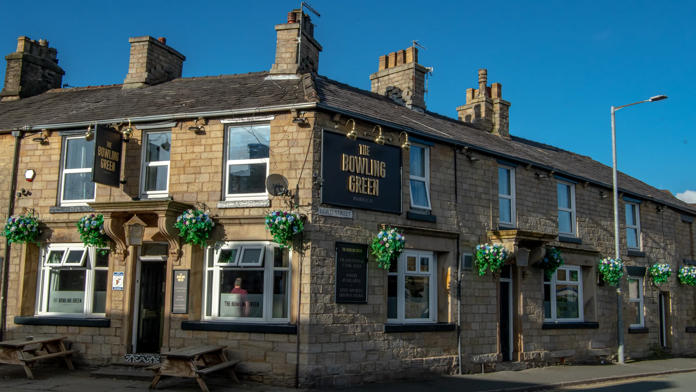 Artificial hanging baskets installed at The Bowling Green